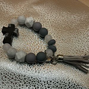 Handmade wristlet Black cross.